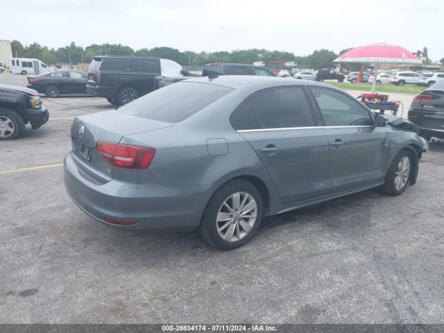 Photo 3 VIN: 3VWD67AJ3GM313757 - VOLKSWAGEN JETTA 