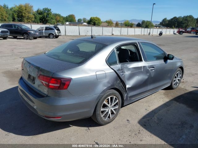 Photo 3 VIN: 3VWD67AJ3GM370704 - VOLKSWAGEN JETTA 