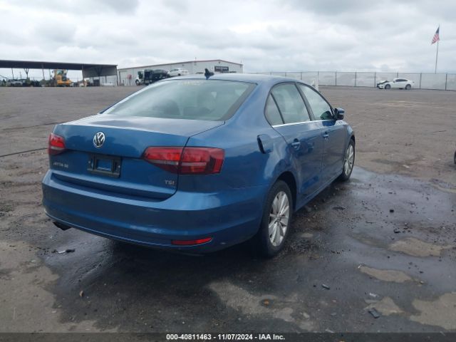 Photo 3 VIN: 3VWD67AJ4GM255416 - VOLKSWAGEN JETTA 