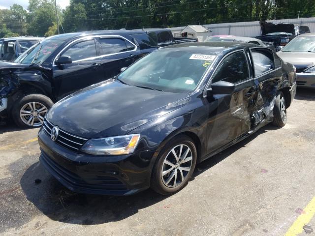 Photo 1 VIN: 3VWD67AJ4GM412989 - VOLKSWAGEN JETTA 