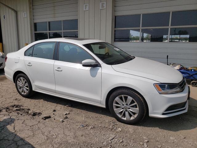 Photo 3 VIN: 3VWD67AJ5GM309175 - VOLKSWAGEN JETTA SE 