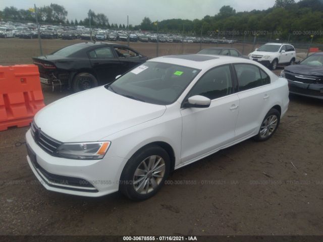 Photo 1 VIN: 3VWD67AJ5GM382742 - VOLKSWAGEN JETTA 