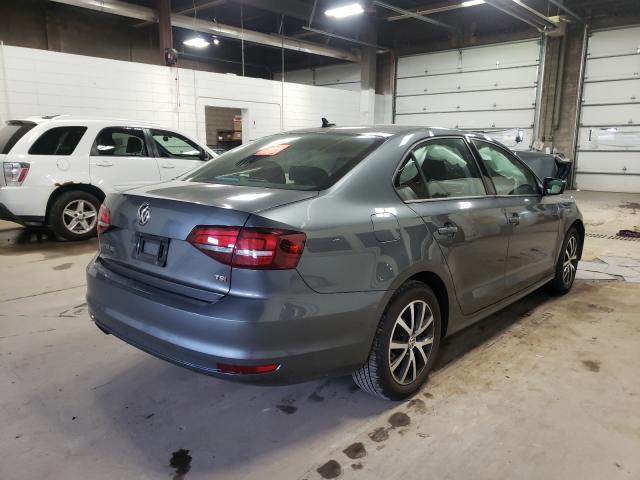 Photo 3 VIN: 3VWD67AJ5GM412855 - VOLKSWAGEN JETTA 