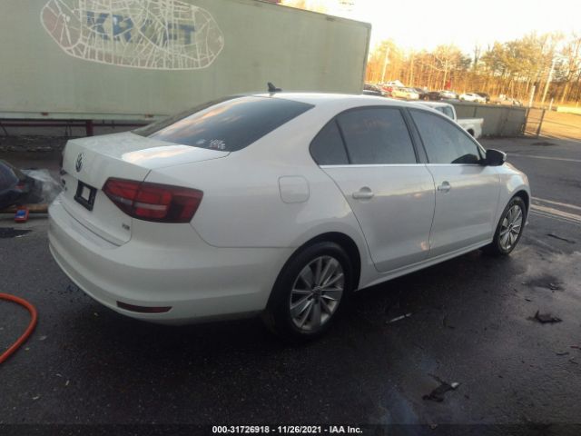 Photo 3 VIN: 3VWD67AJ6GM232459 - VOLKSWAGEN JETTA SEDAN 