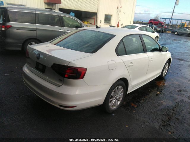 Photo 3 VIN: 3VWD67AJ6GM255398 - VOLKSWAGEN JETTA SEDAN 