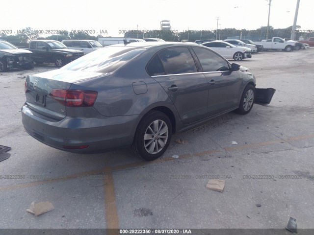 Photo 3 VIN: 3VWD67AJ6GM322923 - VOLKSWAGEN JETTA 