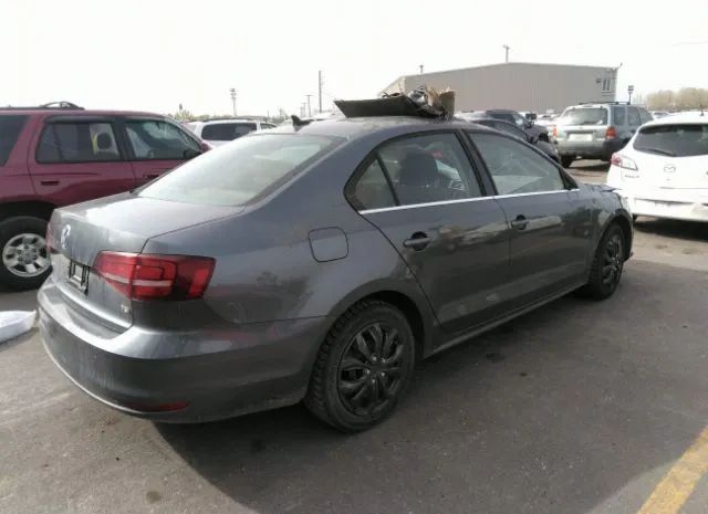 Photo 3 VIN: 3VWD67AJ7GM377669 - VOLKSWAGEN JETTA 