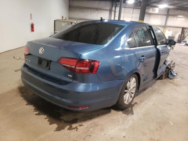 Photo 3 VIN: 3VWD67AJ7GM382886 - VOLKSWAGEN JETTA 