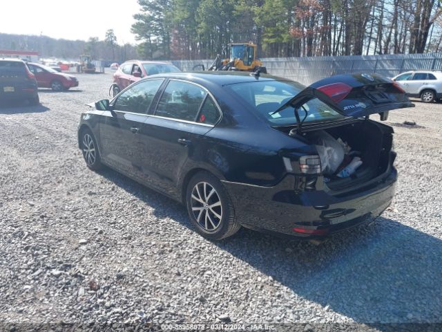 Photo 2 VIN: 3VWD67AJ8GM266158 - VOLKSWAGEN JETTA 