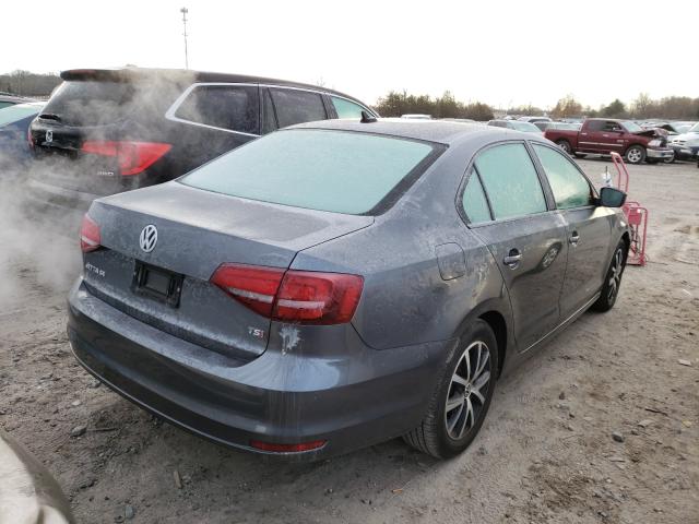 Photo 3 VIN: 3VWD67AJ8GM390897 - VOLKSWAGEN JETTA 