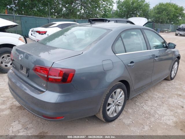 Photo 3 VIN: 3VWD67AJ8GM398854 - VOLKSWAGEN JETTA 