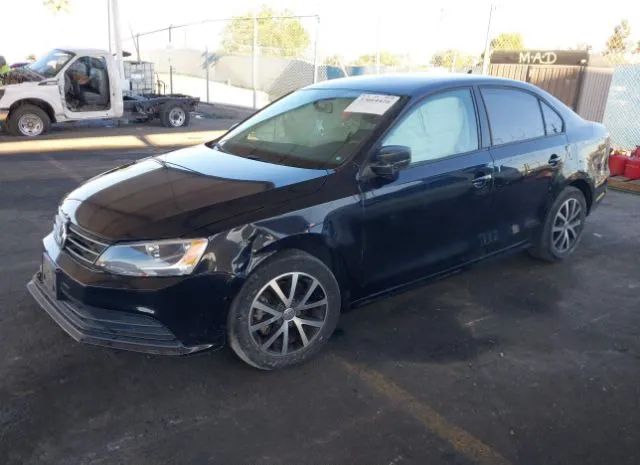 Photo 1 VIN: 3VWD67AJ8GM409710 - VOLKSWAGEN JETTA 