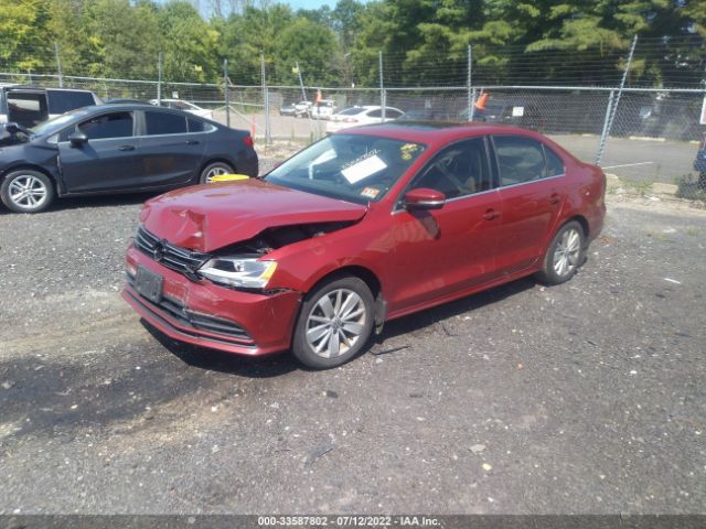 Photo 1 VIN: 3VWD67AJ9GM224887 - VOLKSWAGEN JETTA SEDAN 