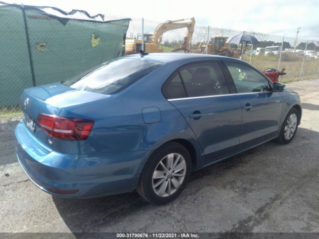 Photo 3 VIN: 3VWD67AJ9GM304724 - VOLKSWAGEN JETTA SEDAN 