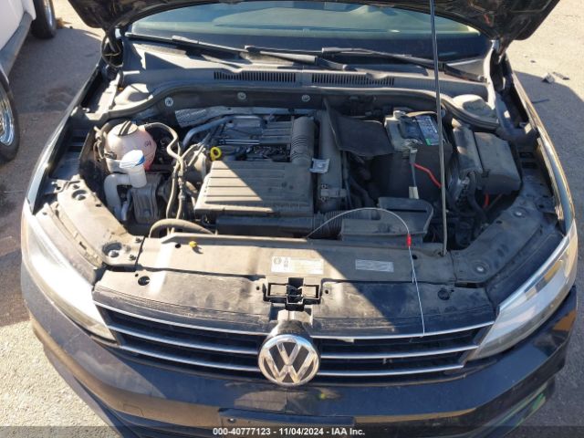 Photo 9 VIN: 3VWD67AJ9GM392559 - VOLKSWAGEN JETTA 