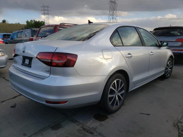 Photo 3 VIN: 3VWD67AJXGM220850 - VOLKSWAGEN JETTA SE 