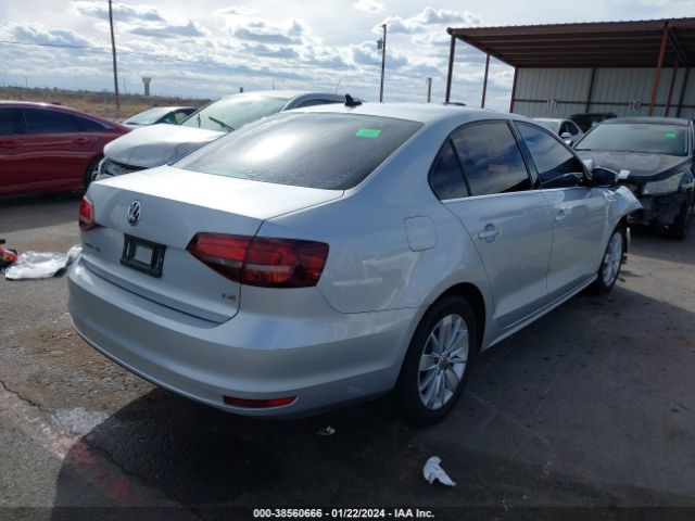 Photo 3 VIN: 3VWD67AJXGM249068 - VOLKSWAGEN JETTA 