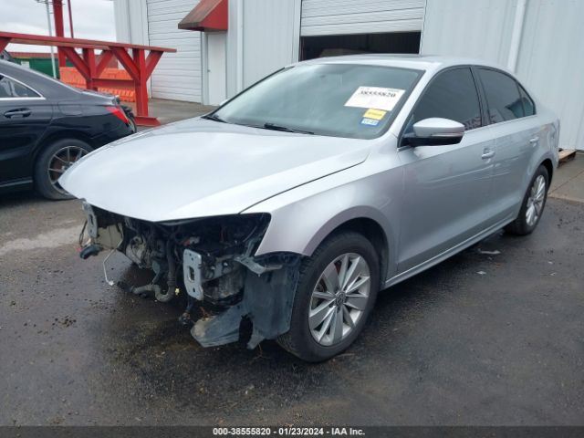 Photo 1 VIN: 3VWD67AJXGM320897 - VOLKSWAGEN JETTA 