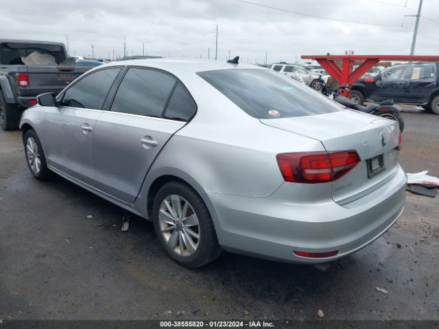 Photo 2 VIN: 3VWD67AJXGM320897 - VOLKSWAGEN JETTA 