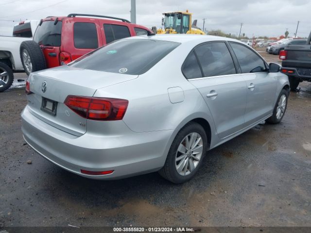 Photo 3 VIN: 3VWD67AJXGM320897 - VOLKSWAGEN JETTA 