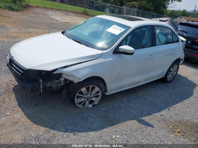 Photo 1 VIN: 3VWD67AJXGM321015 - VOLKSWAGEN JETTA 