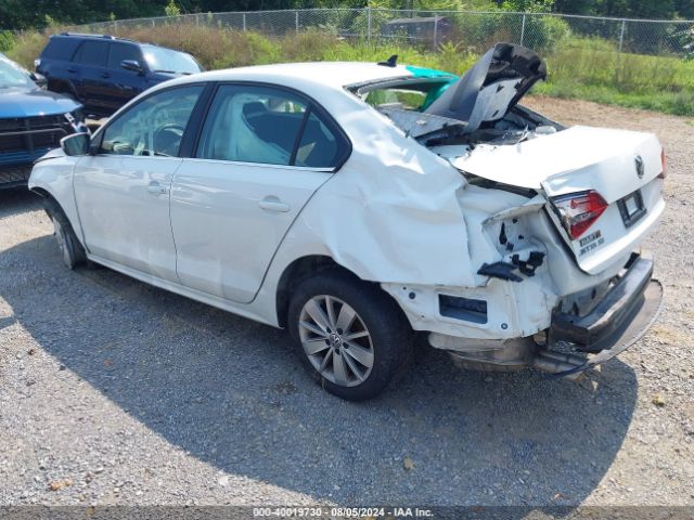 Photo 2 VIN: 3VWD67AJXGM321015 - VOLKSWAGEN JETTA 