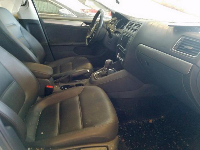 Photo 4 VIN: 3VWD67AJXGM322911 - VOLKSWAGEN JETTA 