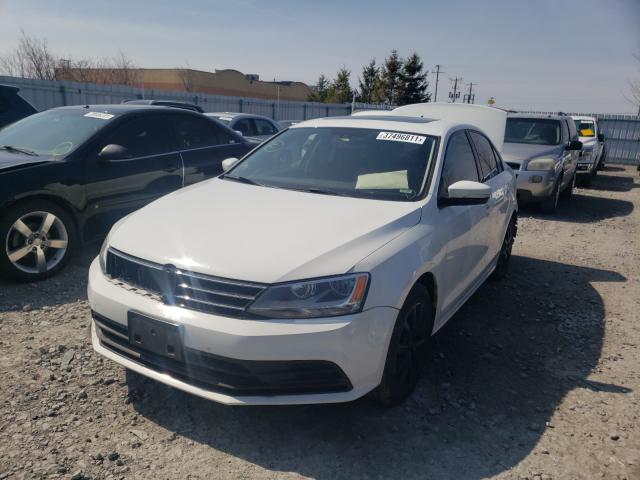 Photo 1 VIN: 3VWD67AJXGM332130 - VOLKSWAGEN JETTA 