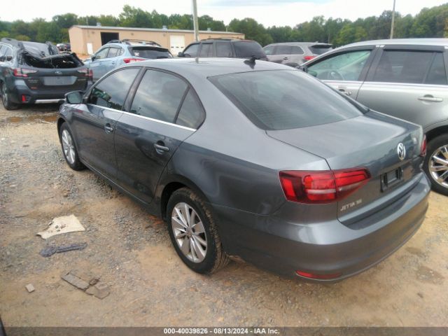 Photo 2 VIN: 3VWD67AJXGM335173 - VOLKSWAGEN JETTA 