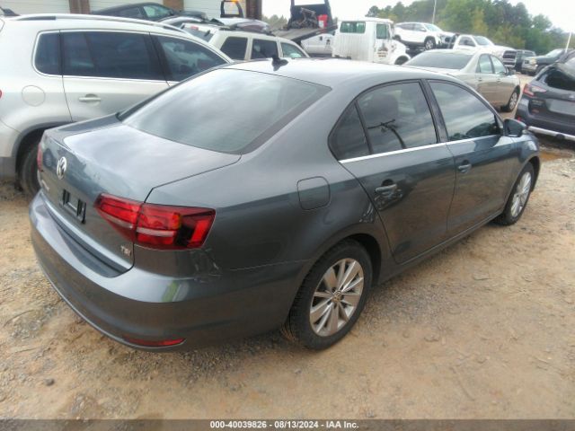 Photo 3 VIN: 3VWD67AJXGM335173 - VOLKSWAGEN JETTA 