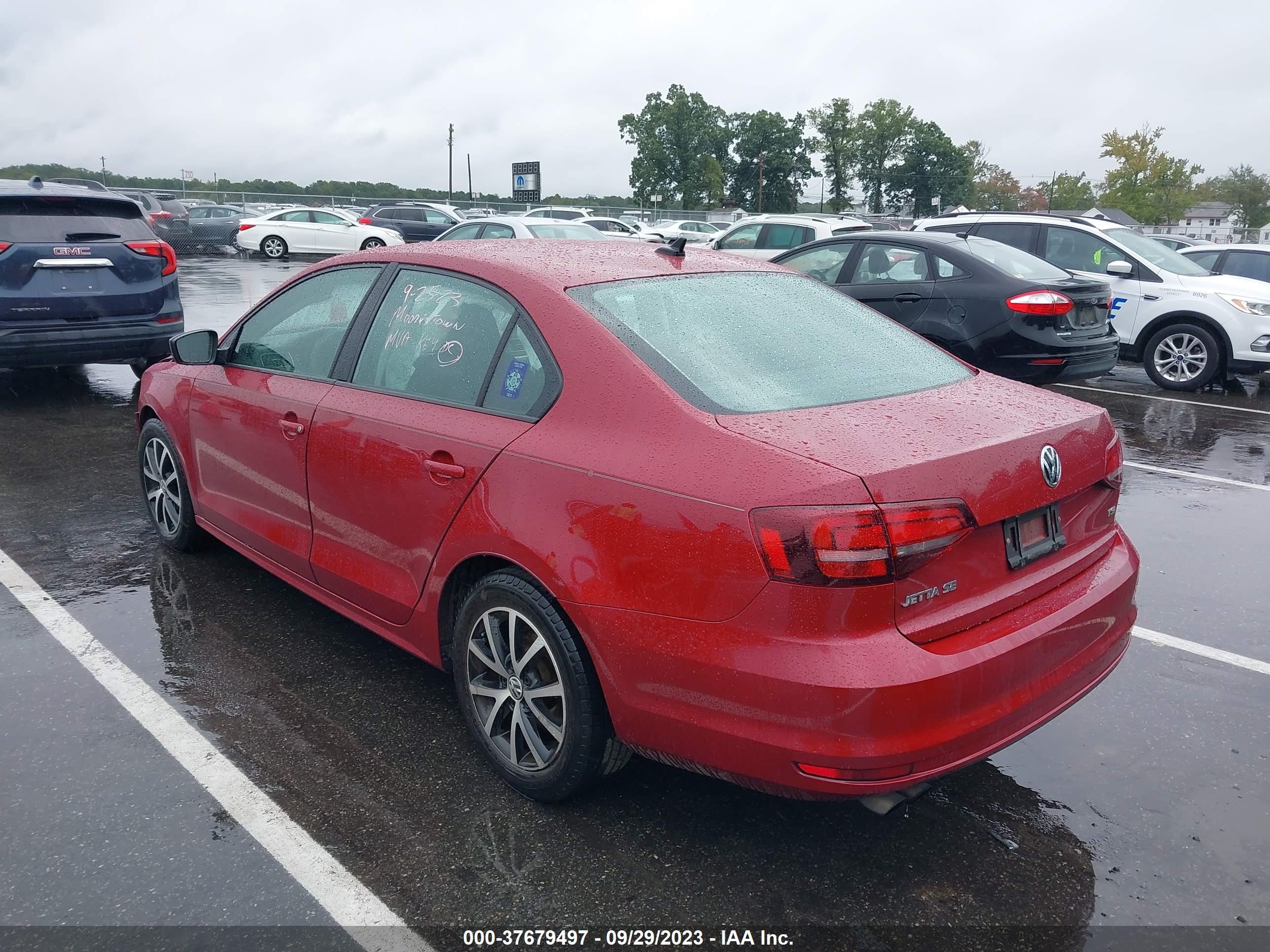 Photo 2 VIN: 3VWD67AJXGM370392 - VOLKSWAGEN JETTA 