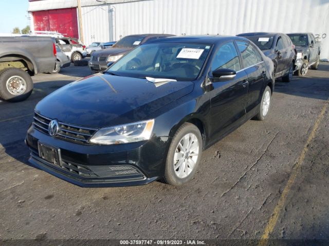 Photo 1 VIN: 3VWD67AJXGM381277 - VOLKSWAGEN JETTA SEDAN 