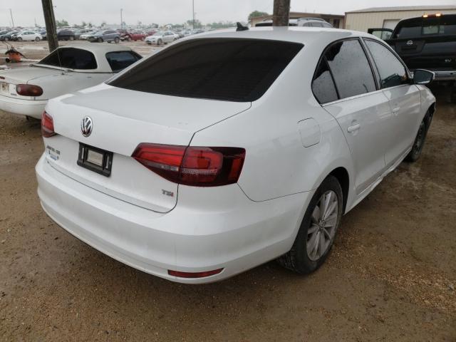 Photo 3 VIN: 3VWD67AJXGM395132 - VOLKSWAGEN JETTA SE 