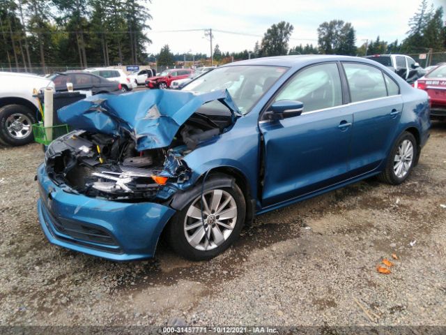 Photo 1 VIN: 3VWD67AJXGM415590 - VOLKSWAGEN JETTA SEDAN 