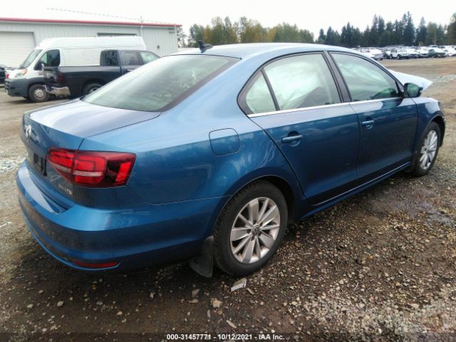 Photo 3 VIN: 3VWD67AJXGM415590 - VOLKSWAGEN JETTA SEDAN 