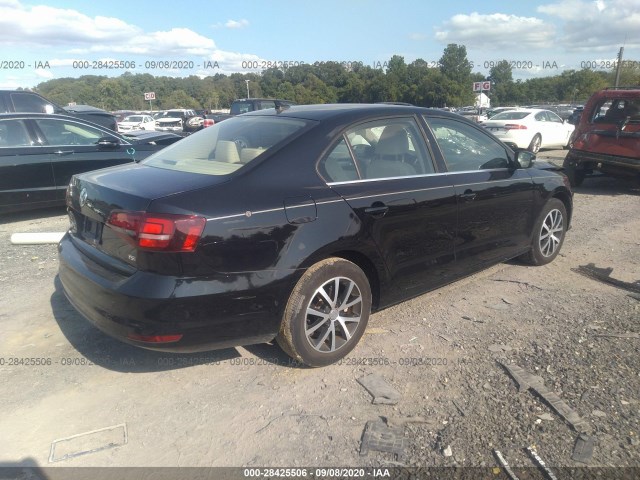 Photo 3 VIN: 3VWDB7AJ7JM215818 - VOLKSWAGEN JETTA 