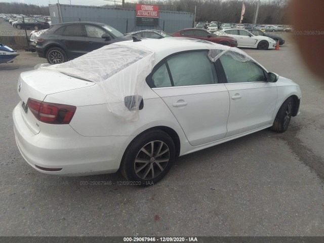 Photo 3 VIN: 3VWDB7AJ7JM232361 - VOLKSWAGEN JETTA 