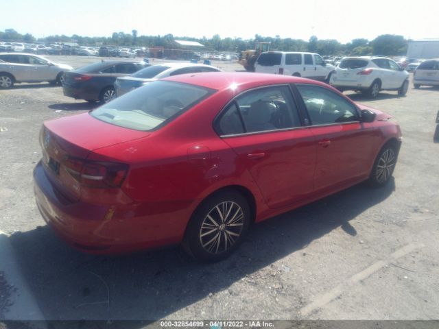 Photo 3 VIN: 3VWDB7AJ9JM222009 - VOLKSWAGEN JETTA 