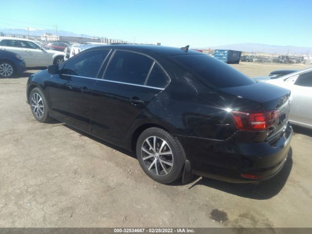 Photo 2 VIN: 3VWDB7AJXJM260848 - VOLKSWAGEN JETTA 