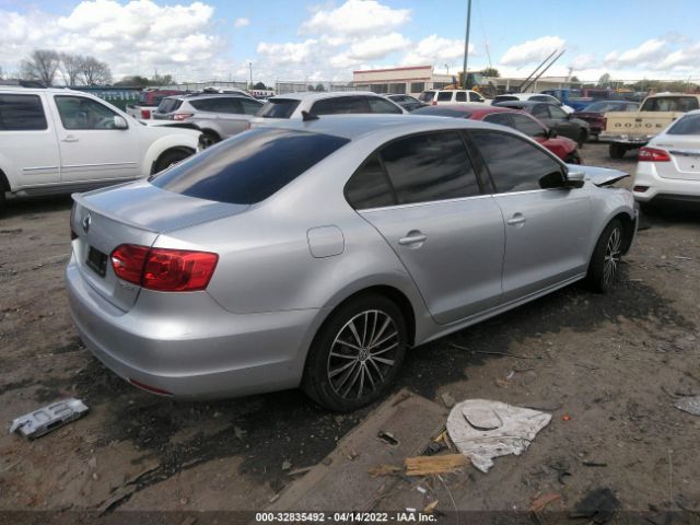 Photo 3 VIN: 3VWDX7AJ4DM311735 - VOLKSWAGEN JETTA SEDAN 