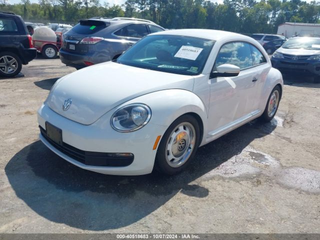 Photo 1 VIN: 3VWF17AT2GM632463 - VOLKSWAGEN BEETLE 