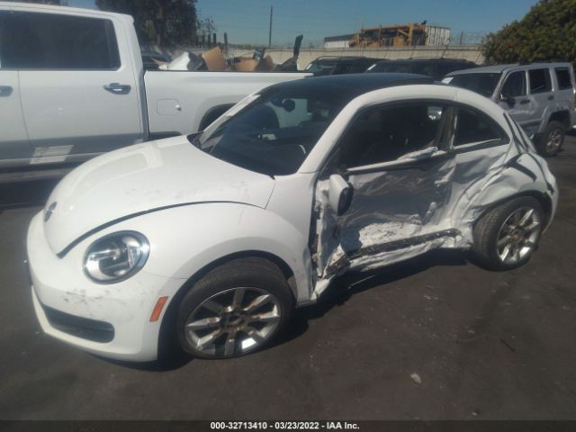 Photo 1 VIN: 3VWJ17AT3GM635933 - VOLKSWAGEN BEETLE COUPE 