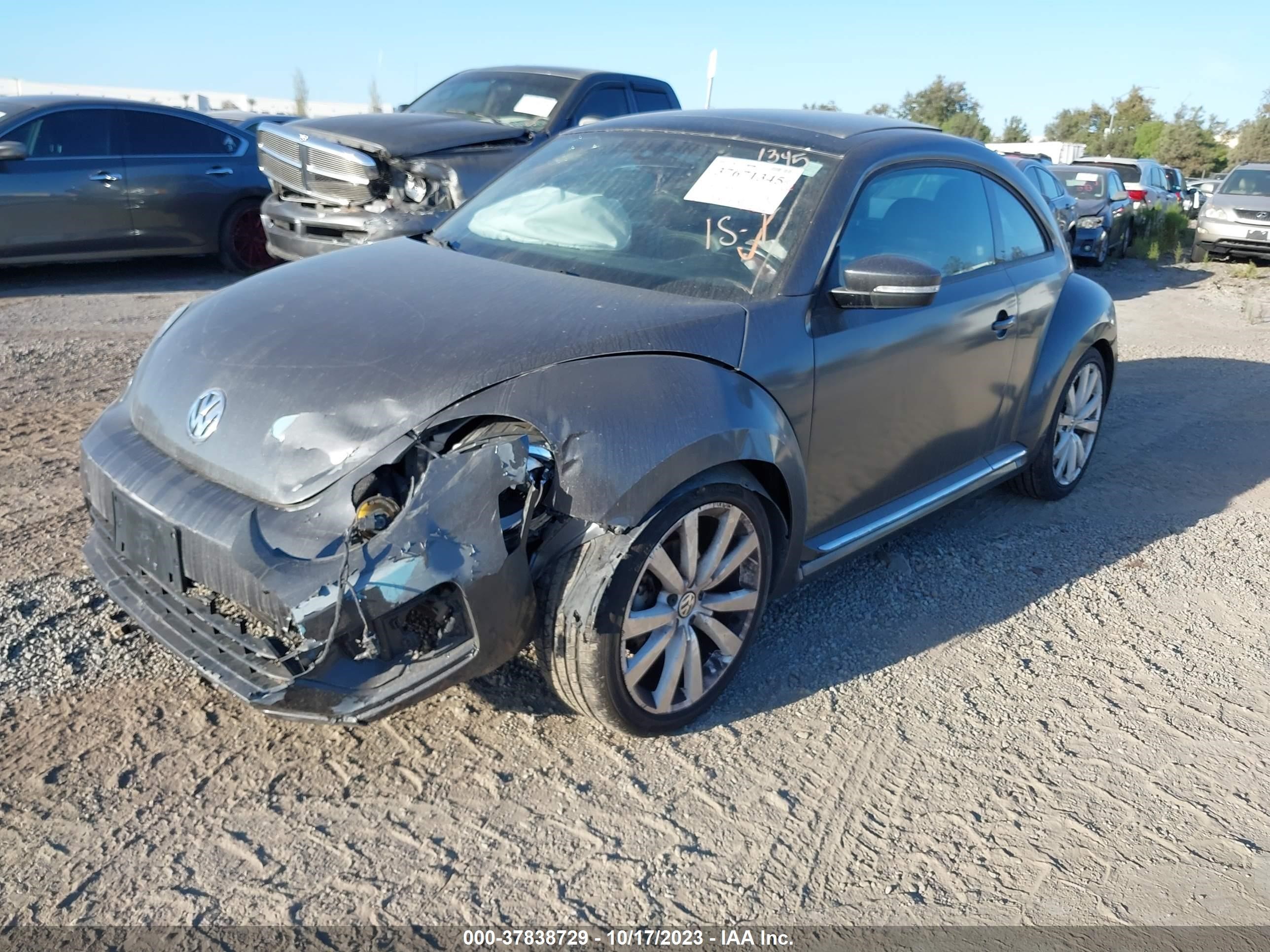 Photo 1 VIN: 3VWJ17AT7EM650030 - VOLKSWAGEN BEETLE COUPE 