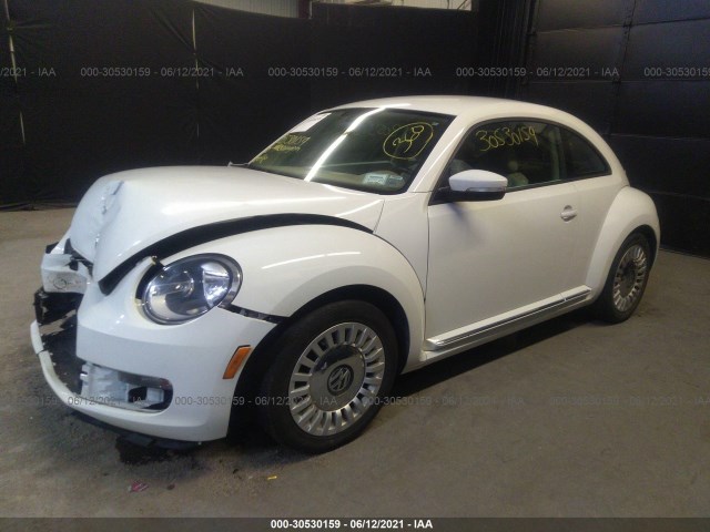 Photo 1 VIN: 3VWJ17ATXGM604596 - VOLKSWAGEN BEETLE 