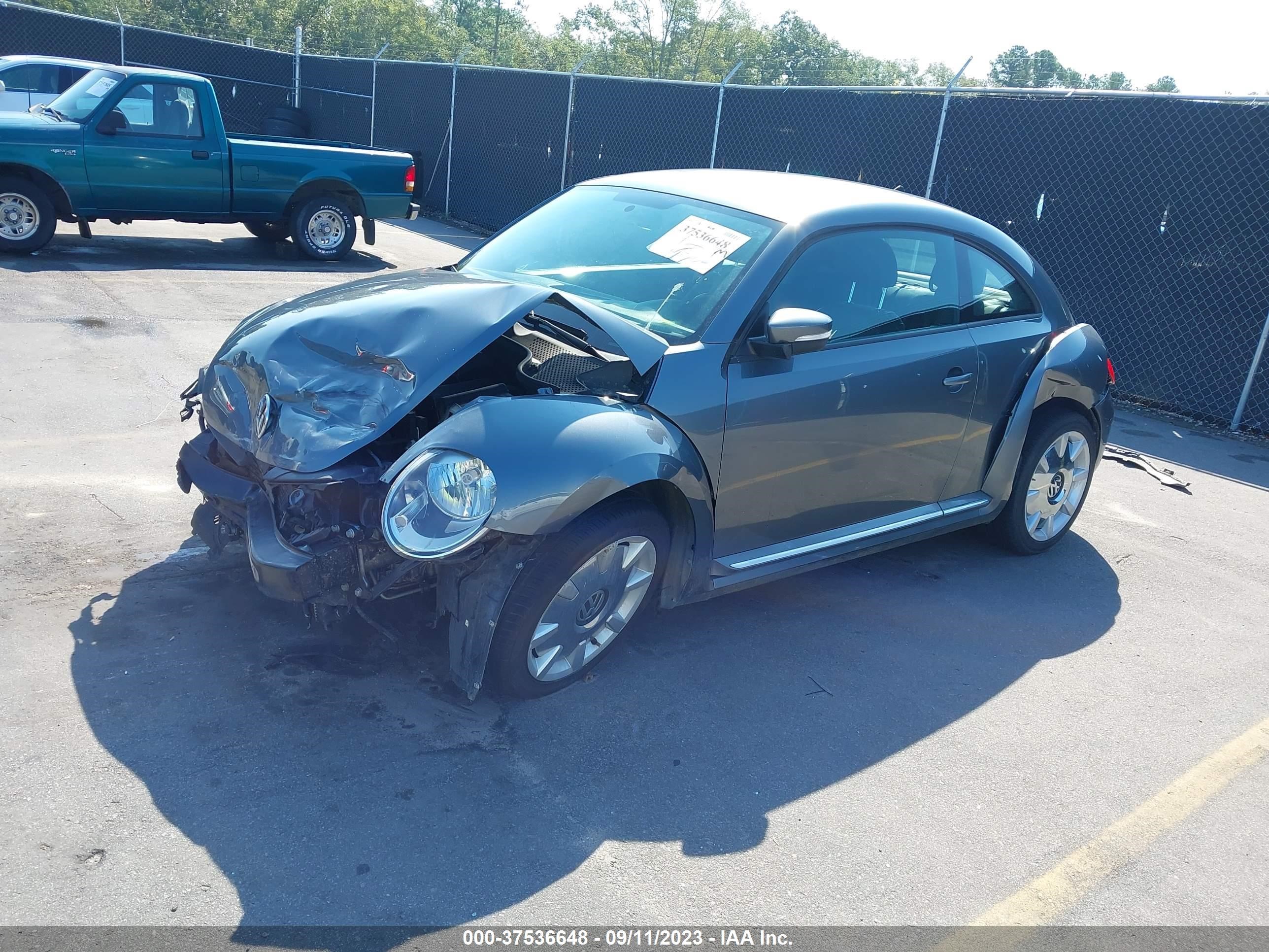 Photo 1 VIN: 3VWJP7AT8CM653837 - VOLKSWAGEN BEETLE 