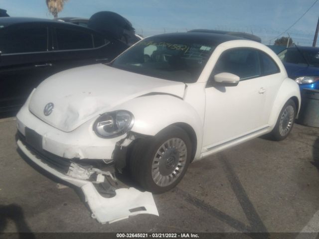 Photo 1 VIN: 3VWJX7AT4EM624998 - VOLKSWAGEN BEETLE COUPE 