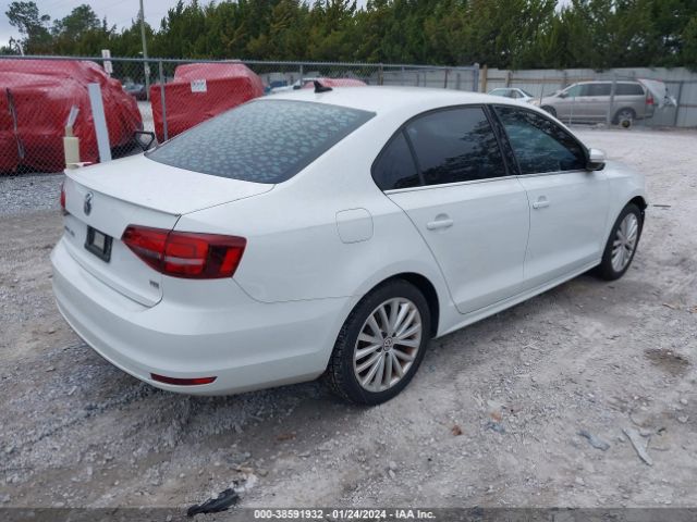 Photo 3 VIN: 3VWL07AJ1GM377521 - VOLKSWAGEN JETTA 