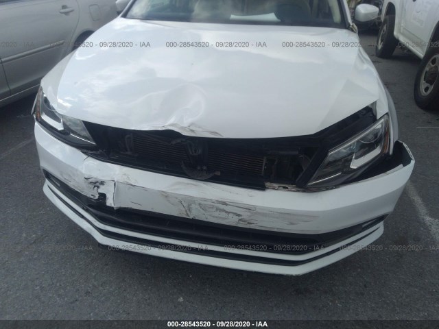 Photo 5 VIN: 3VWL07AJ8GM332902 - VOLKSWAGEN JETTA 