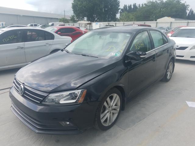 Photo 1 VIN: 3VWL17AJ0FM289314 - VOLKSWAGEN JETTA 