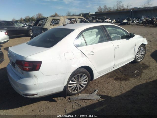 Photo 3 VIN: 3VWL17AJ1GM323228 - VOLKSWAGEN JETTA SEDAN 